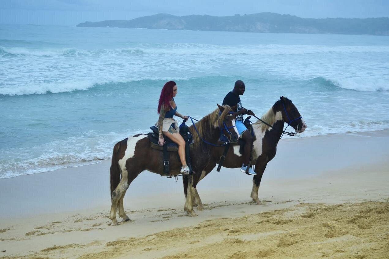 Riding along the beach